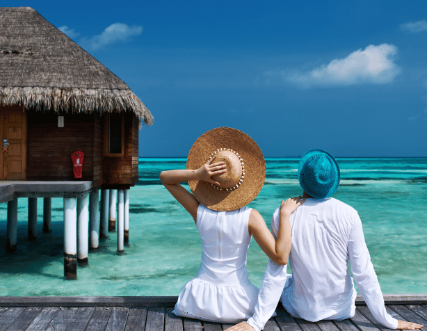 couple at maldives water villa